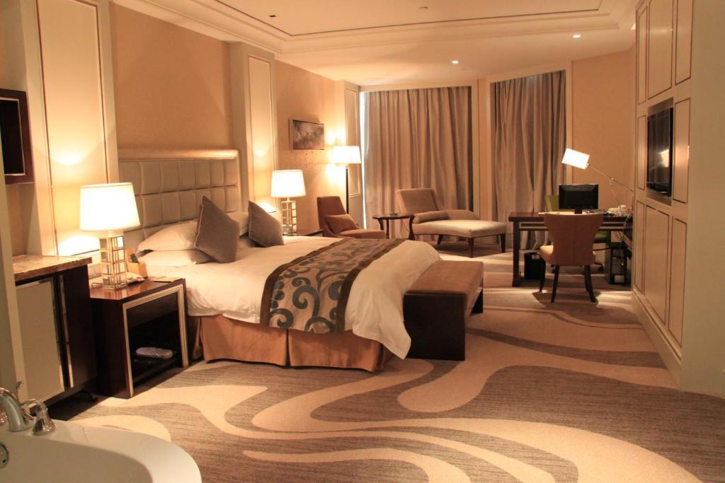 Landison Green Town Hotel Xinchang Rom bilde